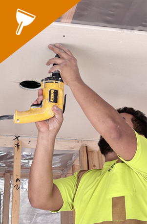 Photo of drywall installer